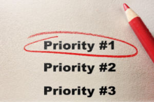Priority #1 circled with red pencil